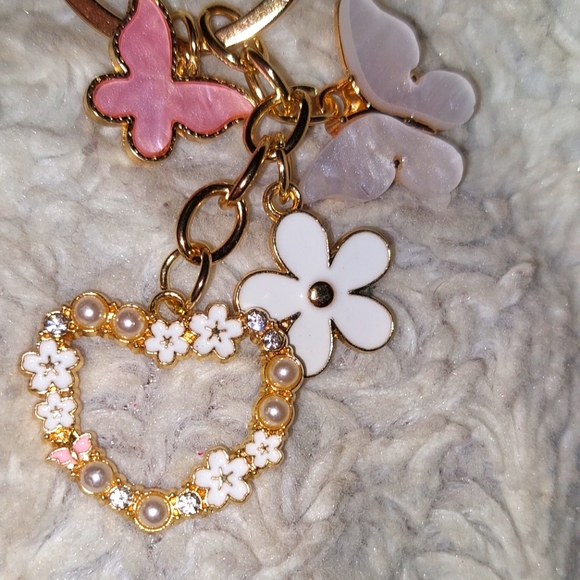 Accessories - SOLD-Butterfly Keychain pink with pearls and gold tone. NWT smoke free home